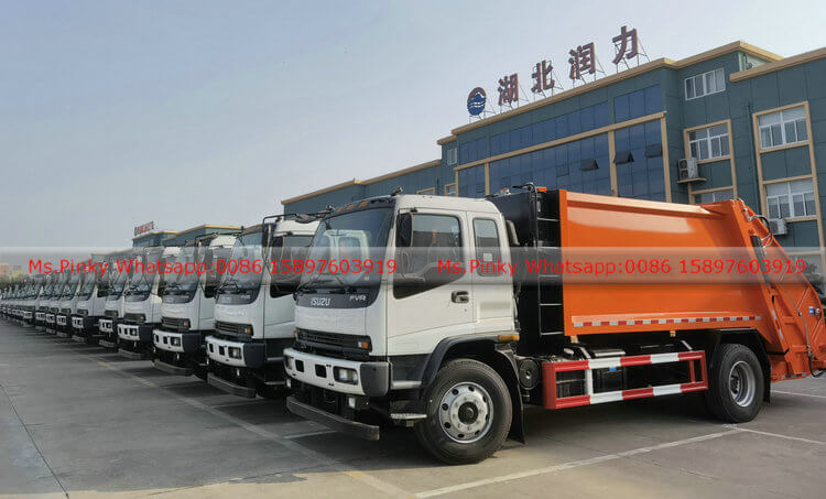 ISUZU FVR refuse compactor mounted on hook loader